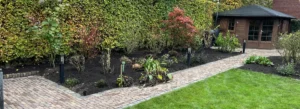 Renovatie van een tuin met nieuwe beplanting
